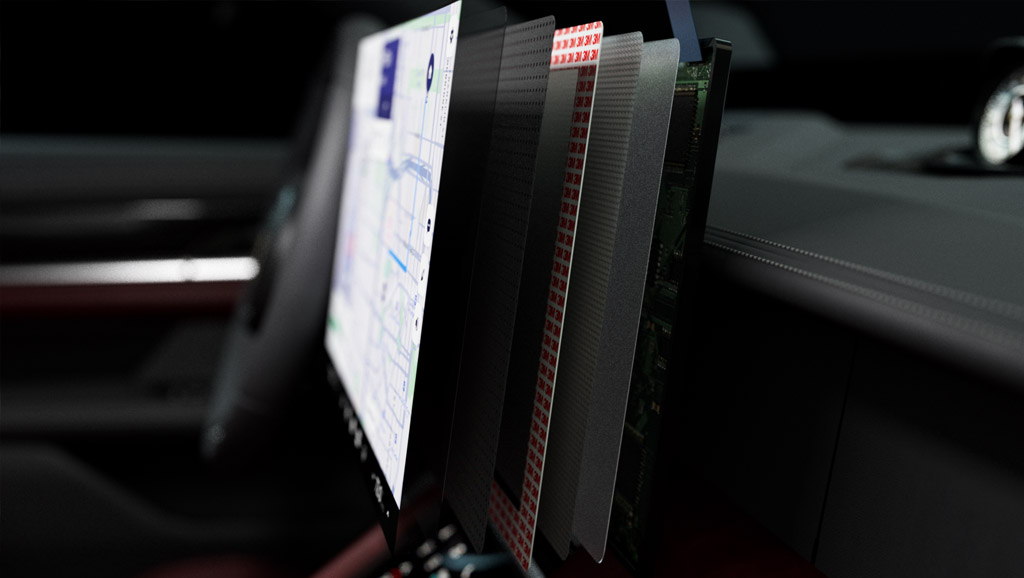 Side view of touchscreen display stack up in an electric car interior.
